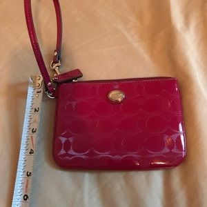 Hot pink coach mini wristlet